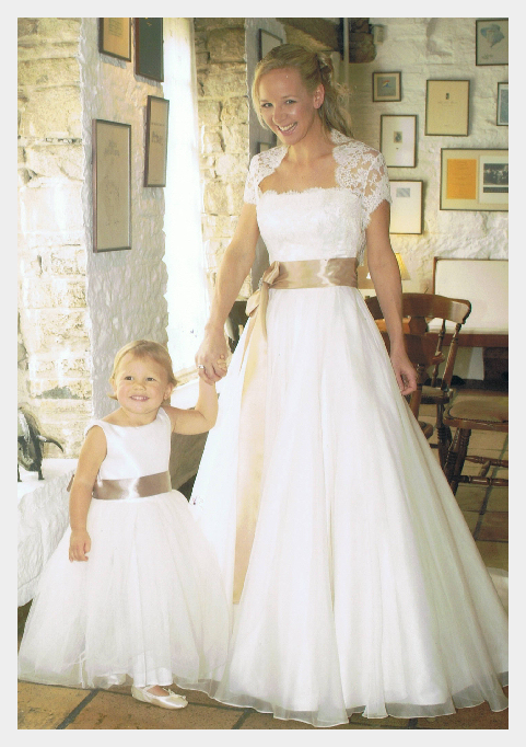 Flower girl dresses by Felicity Westmacott, ivory duchess satin and soft tulle with coffee ribbon sashes
